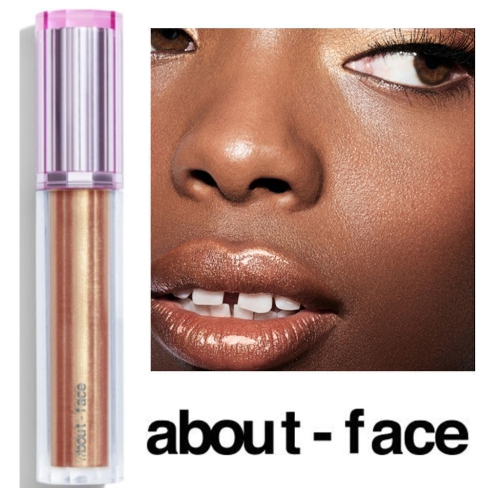 About Face Gloss in Peyto- Golden Pearl Shimmer